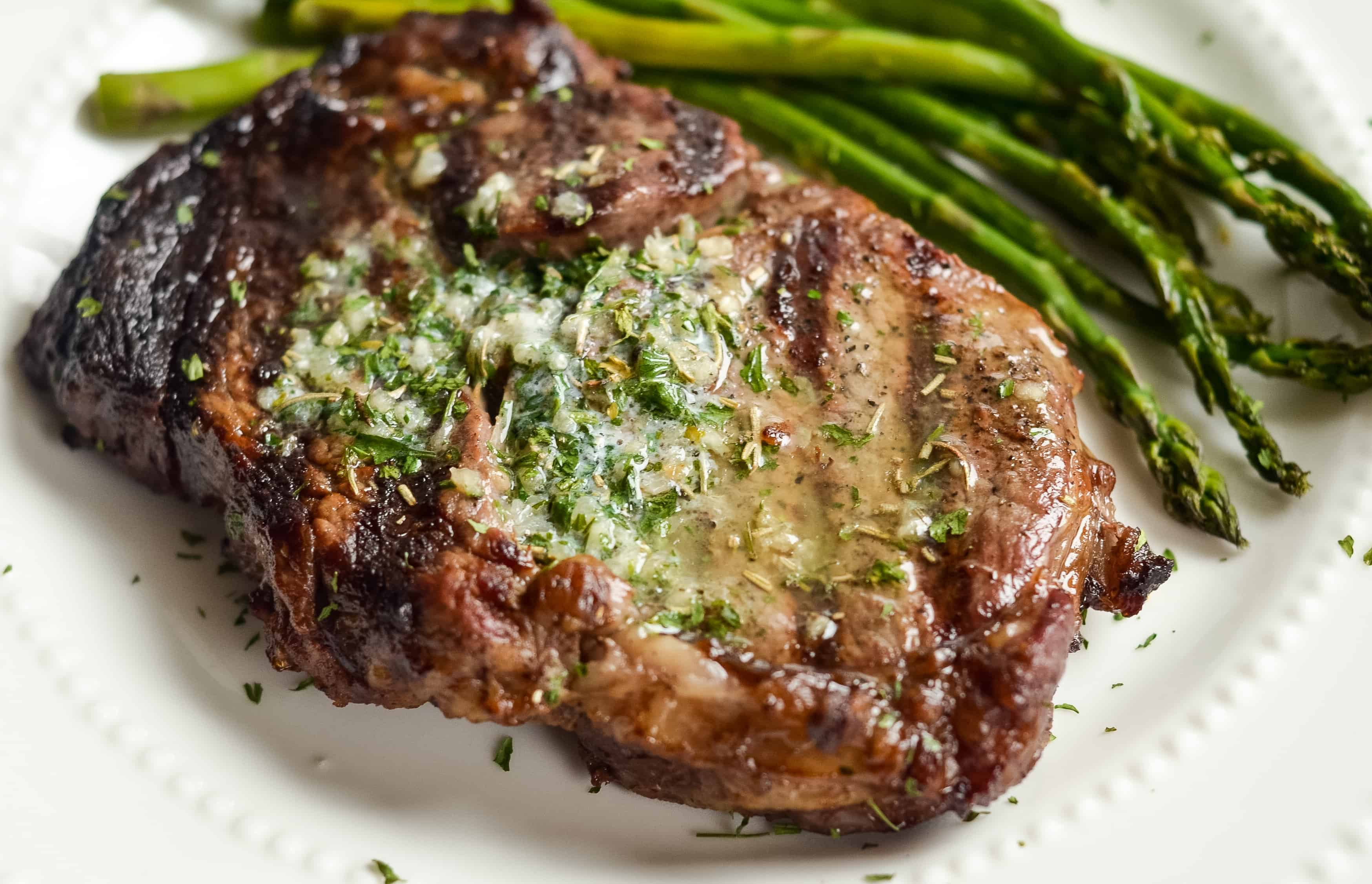 How to Make Garlic Butter Ribeyes on the Grill - Mommy Hates Cooking