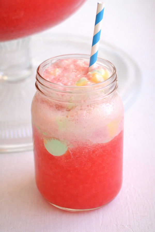 rainbow sherbet punch in a mason jar